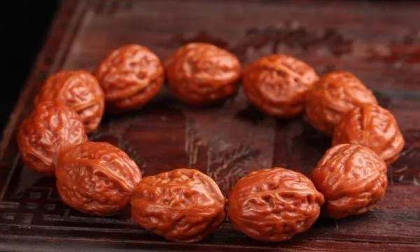 橄榄核机雕和手雕的区别,橄榄核便宜的都是黄胖核吗图12