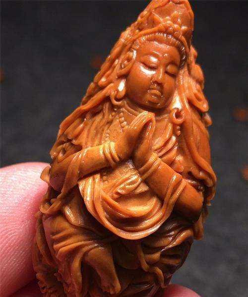 橄榄核机雕和手雕的区别,橄榄核便宜的都是黄胖核吗图1